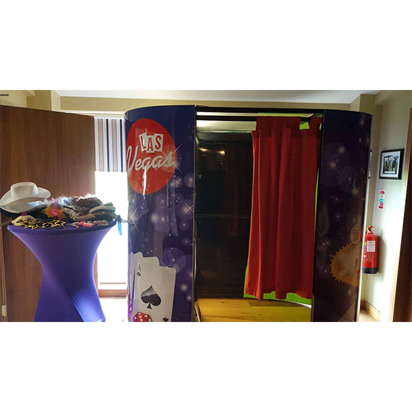 Las Vegas themed photo booth with props table- We do events