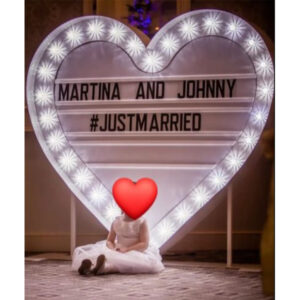 Martina and Johnny #JustMarried sign- We do events