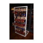 White crisp stand with many small bags- We do events