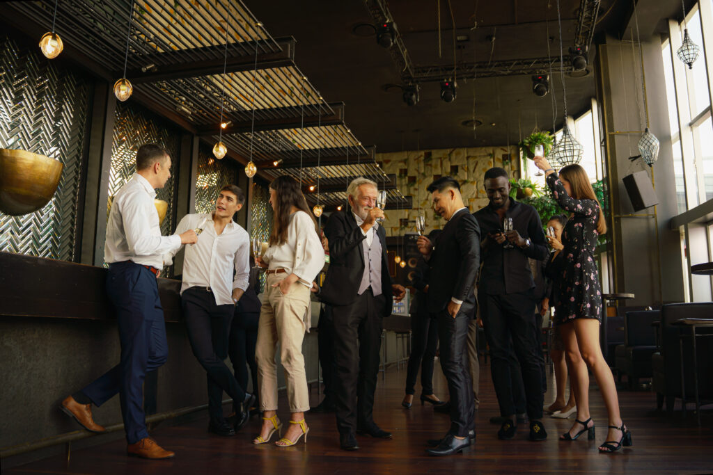 Corporate businesspeople having fun at a party - We do events